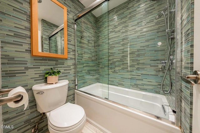2940 N Verdugo Rd Unit 411, Glendale, CA 91208 - full bath with tile walls, shower / bath combination with glass door, and backsplash
