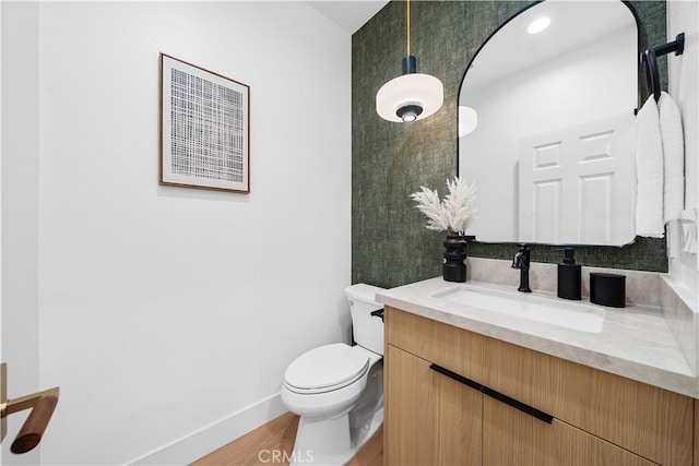 33 Winterfield Rd, Irvine, CA 92602 - half bathroom with vanity and wood finished floors