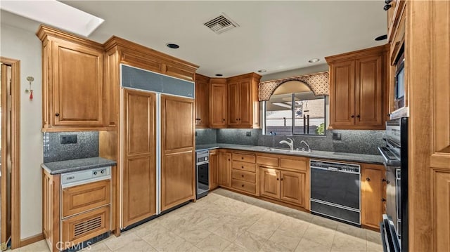4968 Chapala Dr, Riverside, CA 92507 - kitchen with black dishwasher, paneled refrigerator, brown cabinets, decorative backsplash, and recessed lighting