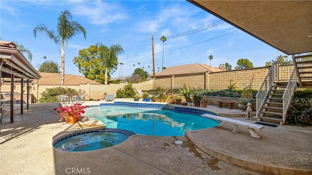 4968 Chapala Dr, Riverside, CA 92507 - view of swimming pool featuring stairs, a fenced backyard, a patio area, and a pool with connected hot tub