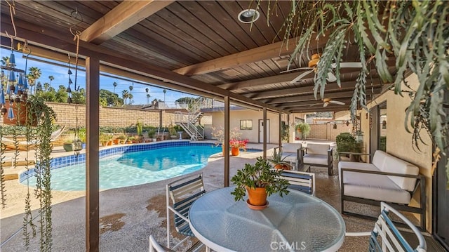 4968 Chapala Dr, Riverside, CA 92507 - view of swimming pool featuring a patio area, a fenced backyard, an outdoor living space, and stairs