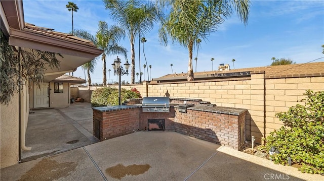 4968 Chapala Dr, Riverside, CA 92507 - fenced backyard with area for grilling and a patio