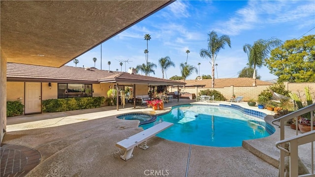 4968 Chapala Dr, Riverside, CA 92507 - view of pool with an in-ground hot tub, a patio, a fenced backyard, and a diving board