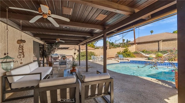 4968 Chapala Dr, Riverside, CA 92507 - fenced backyard with ceiling fan, a patio, and an outdoor hangout area