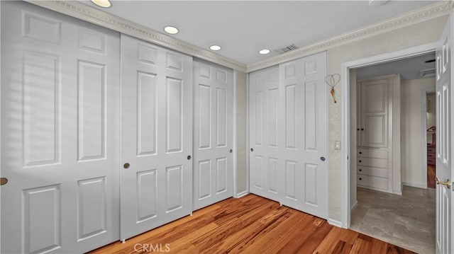 4968 Chapala Dr, Riverside, CA 92507 - unfurnished bedroom with crown molding, recessed lighting, and light wood-type flooring