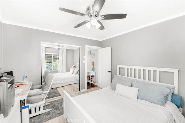 629 E 93rd St, Los Angeles, CA 90002 - bedroom with light wood-style floors, a ceiling fan, and a closet