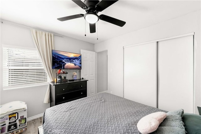 629 E 93rd St, Los Angeles, CA 90002 - bedroom featuring wood finished floors, a closet, and ceiling fan
