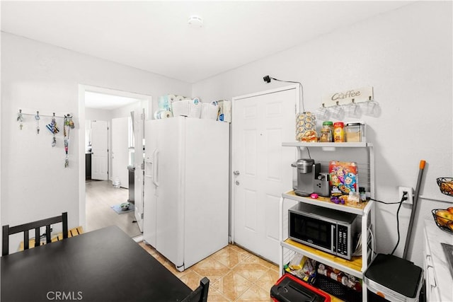 629 E 93rd St, Los Angeles, CA 90002 - kitchen with white fridge with ice dispenser