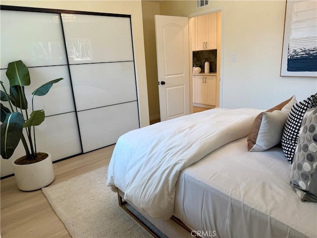 1319 Riedel Ave, Fullerton, CA 92831 - bedroom featuring light wood-style flooring and a closet