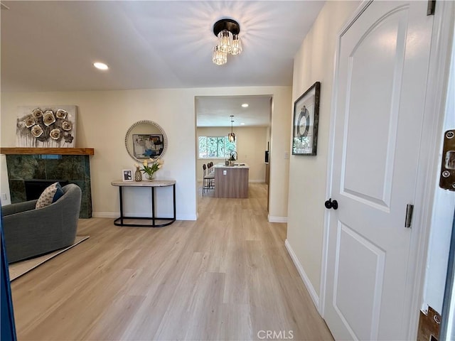 1319 Riedel Ave, Fullerton, CA 92831 - hall with light wood-style flooring, a chandelier, and recessed lighting