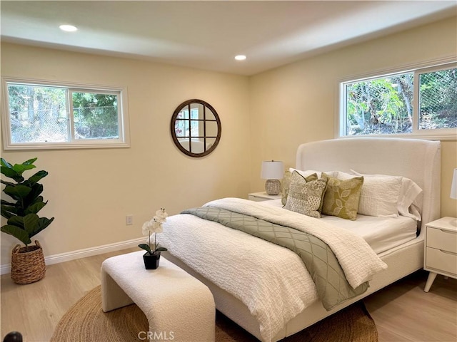 1319 Riedel Ave, Fullerton, CA 92831 - bedroom featuring multiple windows, wood finished floors, and recessed lighting