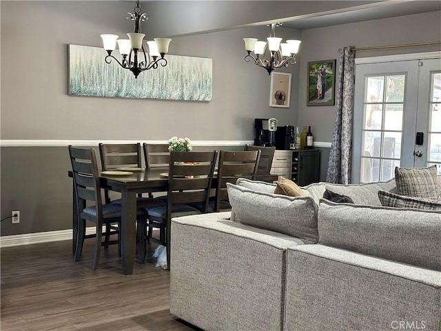 14811 Alexander St, San Fernando, CA 91345 - dining space with a chandelier and wood finished floors