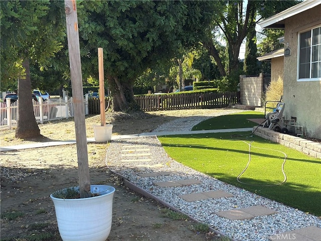 14811 Alexander St, San Fernando, CA 91345 - view of yard featuring an area to practice putting
