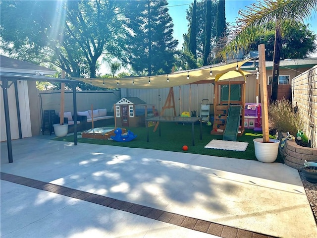 14811 Alexander St, San Fernando, CA 91345 - view of play area with a patio area