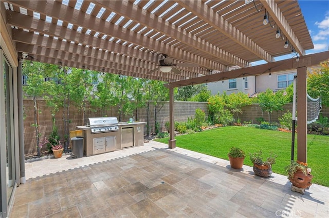 65 Rexford, Irvine, CA 92620 - fenced backyard featuring a ceiling fan, a patio area, a pergola, and exterior kitchen
