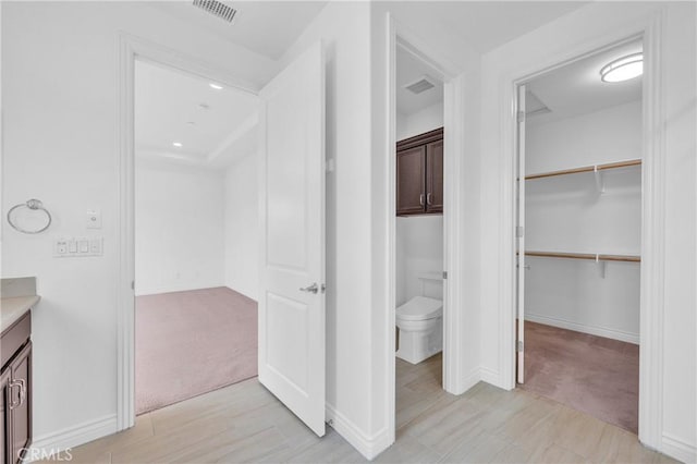 65 Rexford, Irvine, CA 92620 - bathroom featuring vanity and a spacious closet