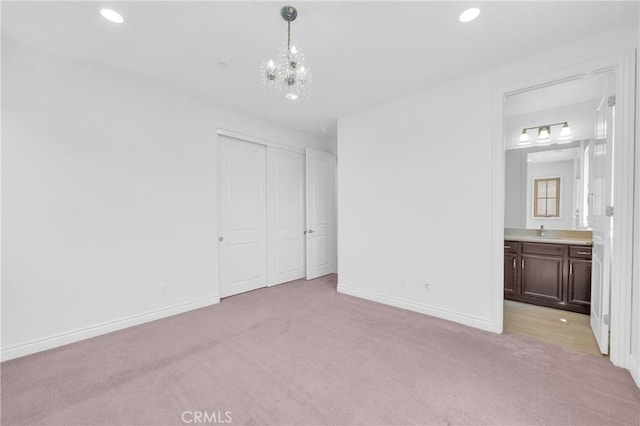 65 Rexford, Irvine, CA 92620 - unfurnished bedroom with light carpet, a closet, a chandelier, recessed lighting, and ensuite bathroom