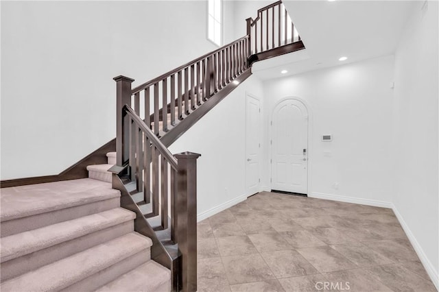 65 Rexford, Irvine, CA 92620 - staircase featuring recessed lighting and a high ceiling