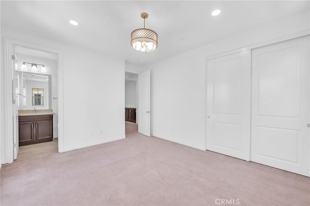 65 Rexford, Irvine, CA 92620 - unfurnished bedroom featuring light colored carpet, a closet, recessed lighting, and ensuite bath