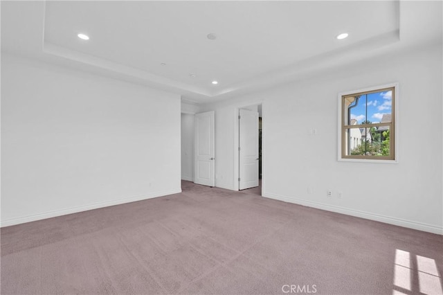 65 Rexford, Irvine, CA 92620 - unfurnished room featuring a tray ceiling, recessed lighting, and carpet