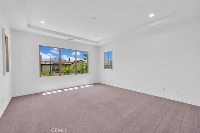 65 Rexford, Irvine, CA 92620 - empty room with a tray ceiling, recessed lighting, and carpet