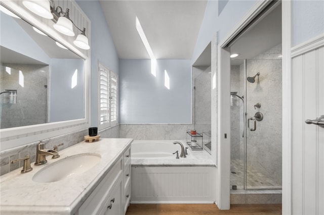 747 Highland View Dr, Corona, CA 92882 - full bath with a shower stall, a garden tub, vanity, wood finished floors, and vaulted ceiling