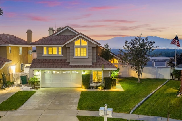 747 Highland View Dr, Corona, CA 92882 - view of front of house featuring driveway, an attached garage, a chimney, and a mountain view