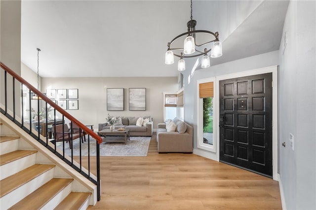747 Highland View Dr, Corona, CA 92882 - entryway featuring a chandelier, wood finished floors, and stairway