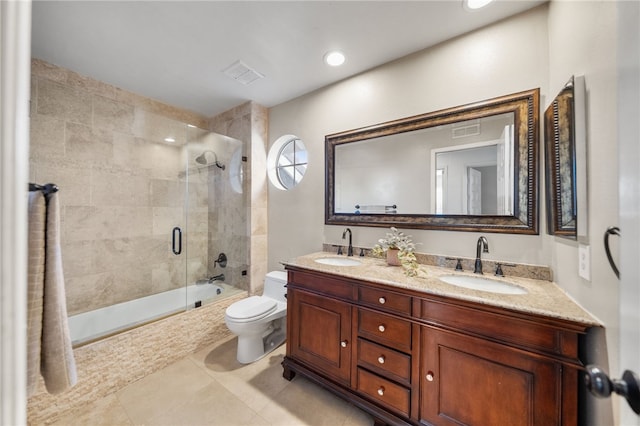 747 Highland View Dr, Corona, CA 92882 - bathroom featuring tiled shower / bath combo, double vanity, tile patterned floors, and recessed lighting