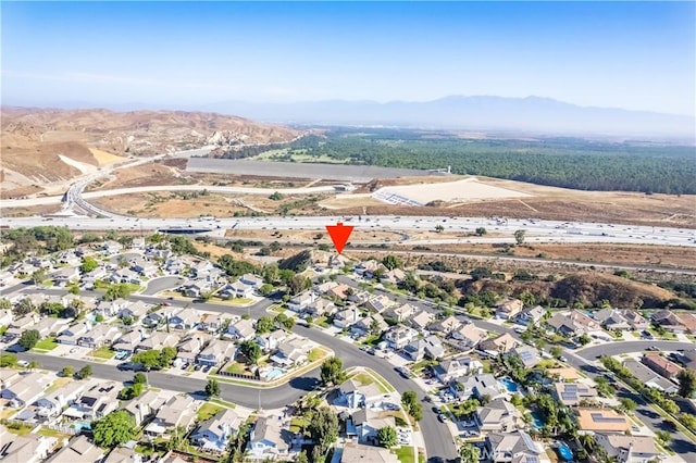 747 Highland View Dr, Corona, CA 92882 - aerial view of property's location with a mountainous background and nearby suburban area