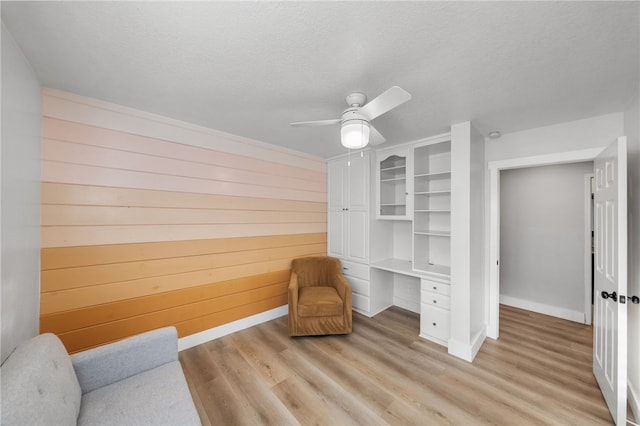 747 Highland View Dr, Corona, CA 92882 - living area with a ceiling fan, light wood-type flooring, and a textured ceiling
