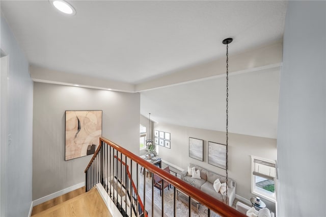 747 Highland View Dr, Corona, CA 92882 - hall featuring light wood finished floors, healthy amount of natural light, an upstairs landing, and vaulted ceiling