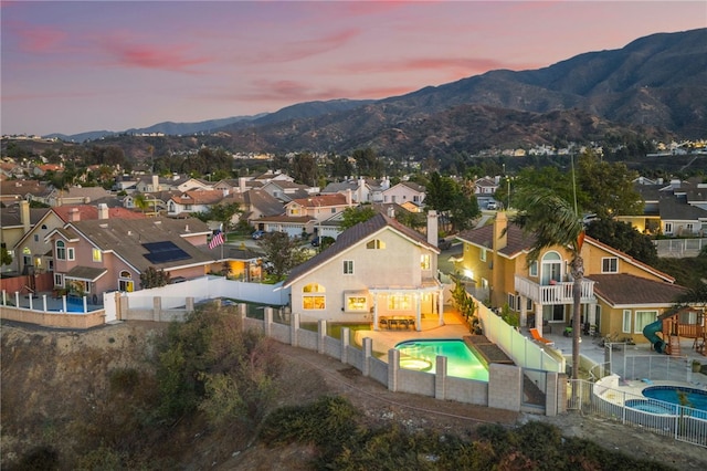 747 Highland View Dr, Corona, CA 92882 - aerial perspective of suburban area with a pool and mountains