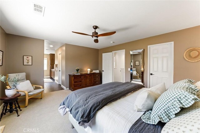 23004 Seattle Ridge Rd, Wildomar, CA 92595 - bedroom with carpet flooring, ensuite bathroom, and ceiling fan