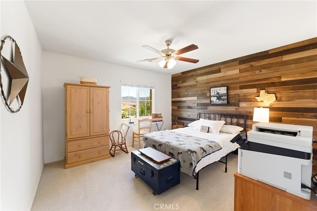 23004 Seattle Ridge Rd, Wildomar, CA 92595 - bedroom with wooden walls, light colored carpet, and ceiling fan