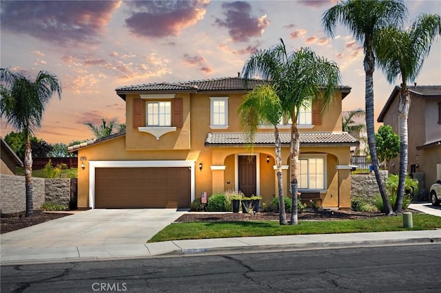 23004 Seattle Ridge Rd, Wildomar, CA 92595 - mediterranean / spanish house with a tile roof, concrete driveway, stucco siding, and an attached garage