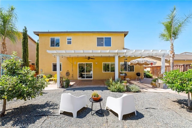 23004 Seattle Ridge Rd, Wildomar, CA 92595 - rear view of house featuring a pergola, stucco siding, a patio, and ceiling fan