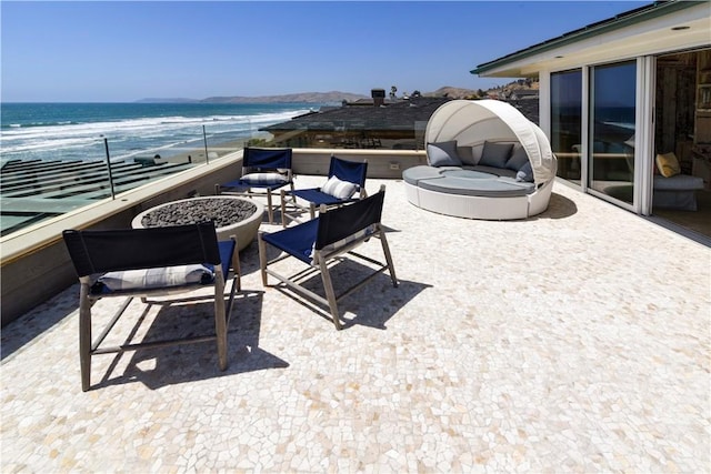 3436 Studio Dr, Cayucos, CA 93430 - view of patio / terrace featuring a fire pit and view of water and beach