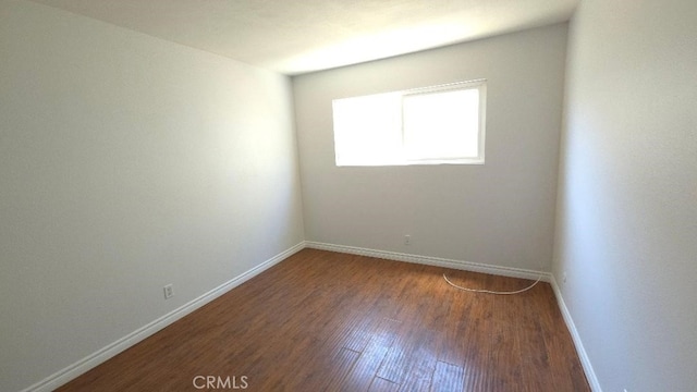 22127 Halsted St, Chatsworth, CA 91311 - spare room featuring wood finished floors and baseboards
