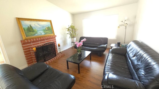 22127 Halsted St, Chatsworth, CA 91311 - living area with wood finished floors and a fireplace