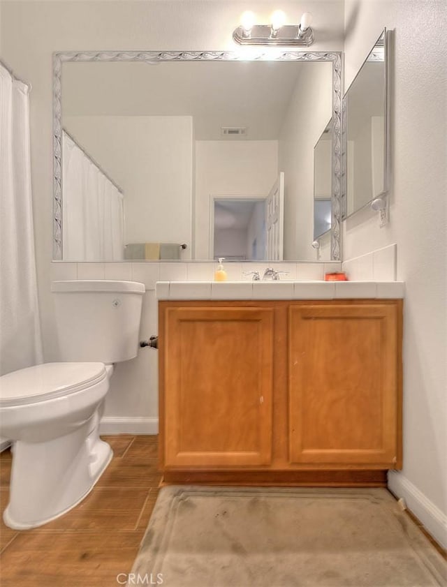 1503 Lynwood Way, Highland, CA 92346 - bathroom featuring vanity and wood finished floors