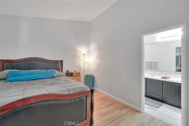 1503 Lynwood Way, Highland, CA 92346 - bedroom featuring light wood-style floors and connected bathroom