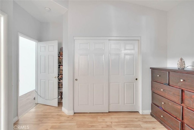 1503 Lynwood Way, Highland, CA 92346 - bedroom featuring light wood-style floors and a closet