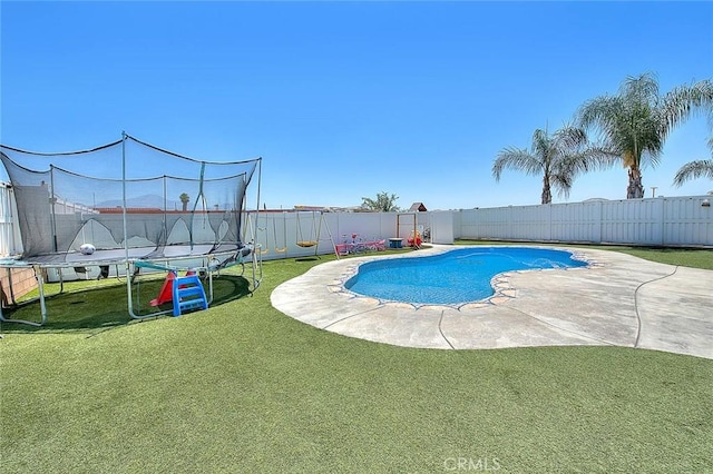 1503 Lynwood Way, Highland, CA 92346 - view of swimming pool featuring a trampoline, a fenced backyard, and a patio