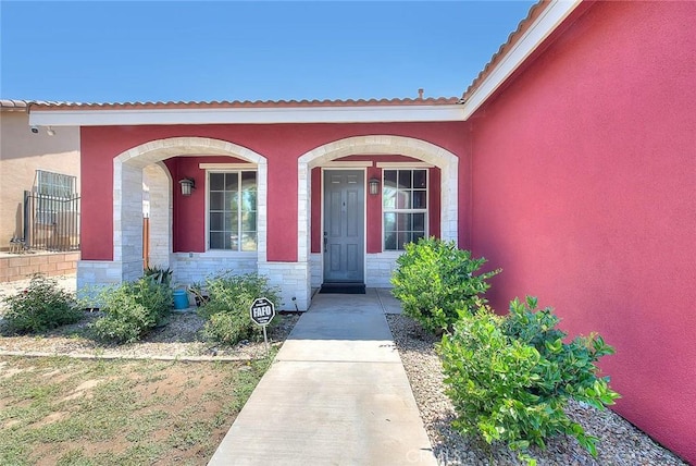 1503 Lynwood Way, Highland, CA 92346 - doorway to property featuring stone siding and stucco siding