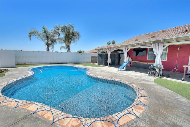 1503 Lynwood Way, Highland, CA 92346 - view of swimming pool featuring a patio and a fenced backyard