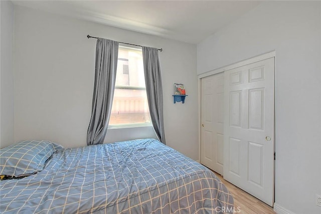 1503 Lynwood Way, Highland, CA 92346 - bedroom with wood finished floors and a closet
