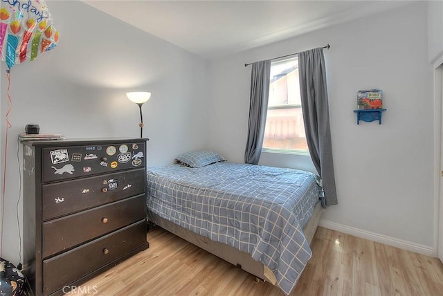 1503 Lynwood Way, Highland, CA 92346 - bedroom with light wood-style floors and baseboards
