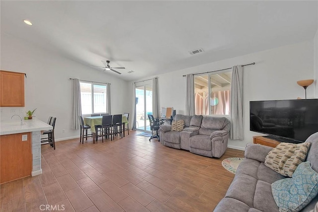 1503 Lynwood Way, Highland, CA 92346 - living room featuring ceiling fan and light wood-type flooring