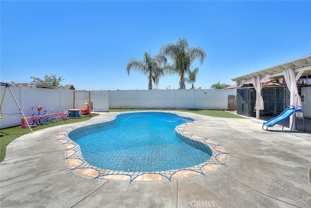 1503 Lynwood Way, Highland, CA 92346 - view of swimming pool with a fenced backyard and a patio